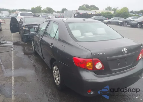 2009 Toyota Corolla Le from USA, damaged, VIN 1NXBU40E99Z092386